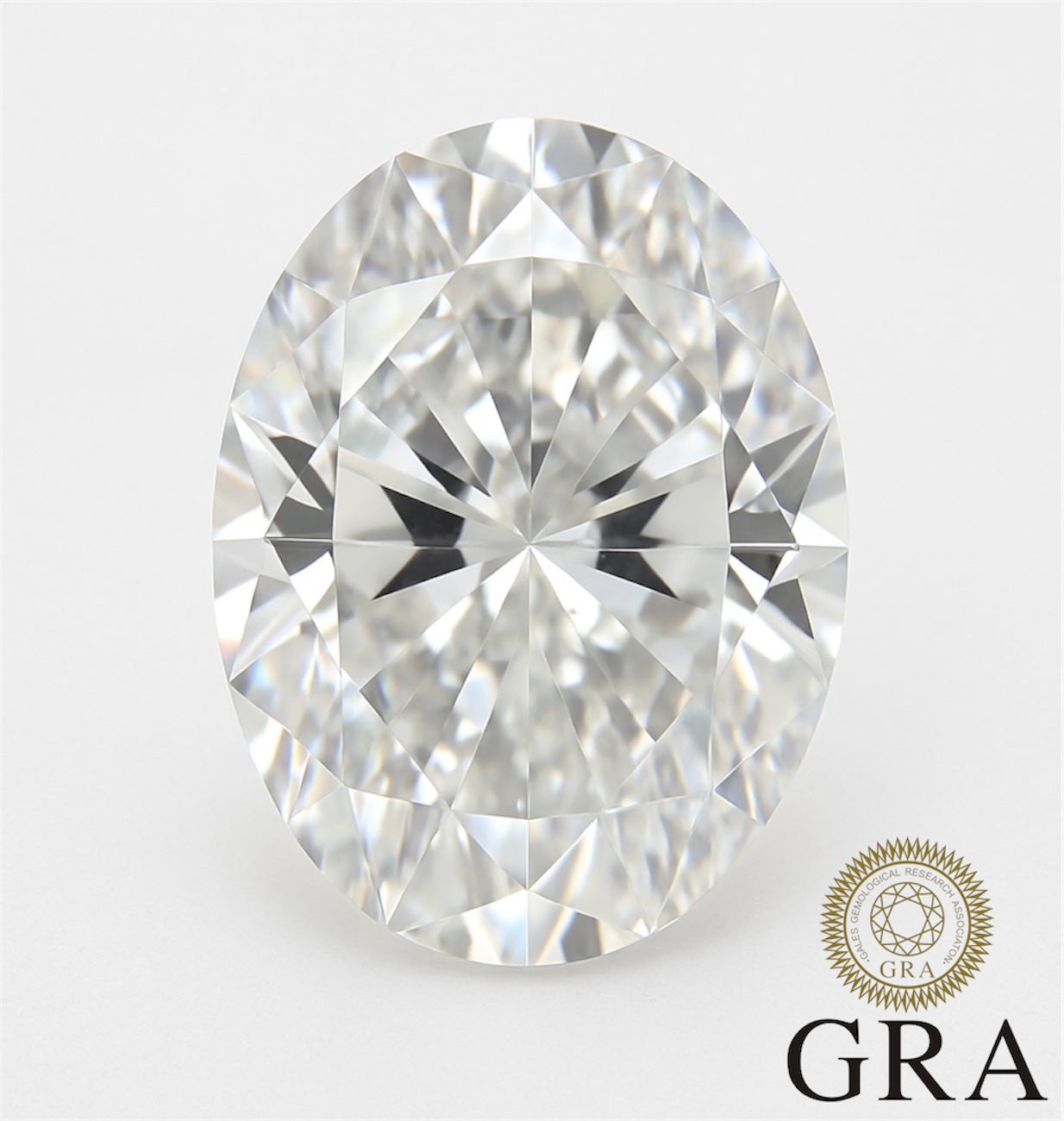 2ct oval cut moissanite gemstone with exceptional sparkle and GRA certification against a white background